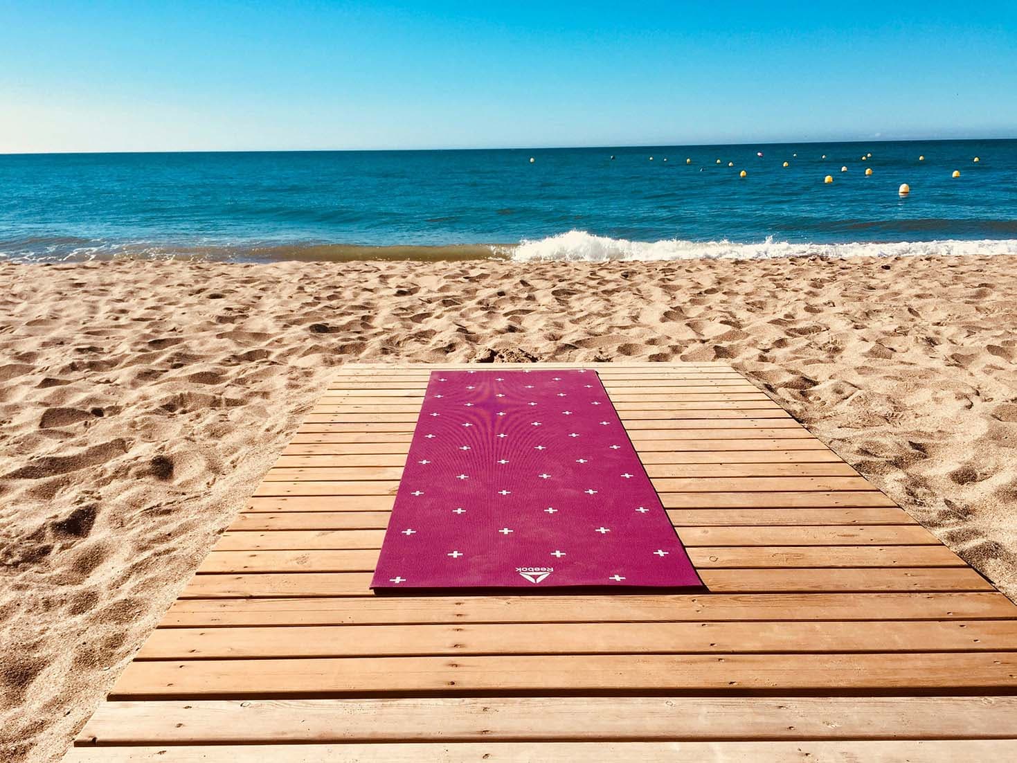 yoga mat on beach
